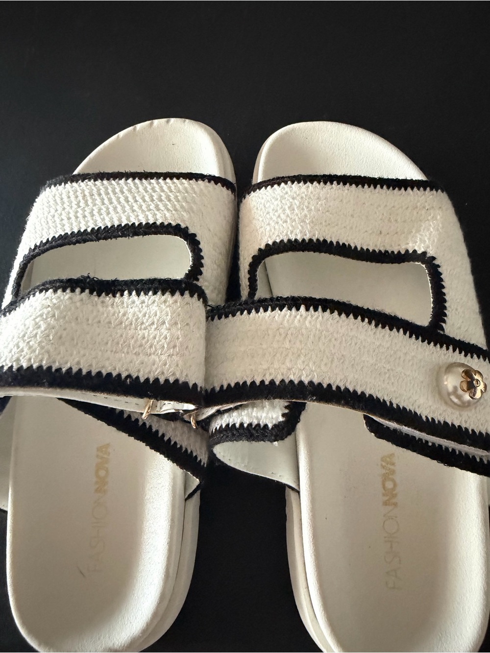 Fashion Nova White Slide Sandals with Black Trim and Gold Accent